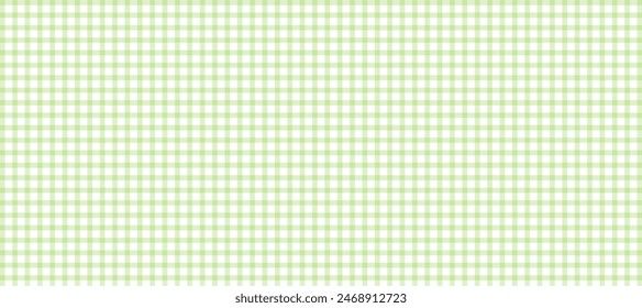 Green and white plaid fabric texture as a background