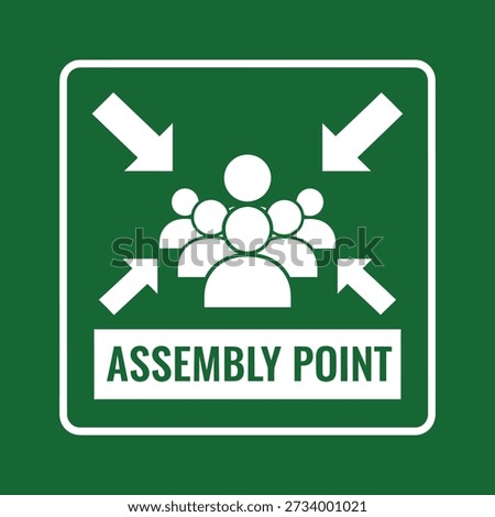 A green and white sign indicating an assembly point with a group of people icon and directional arrows.