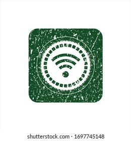 Green wifi signal icon inside rubber grunge texture stamp