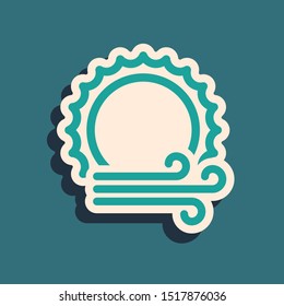Green Wind and sun icon isolated on blue background. Windy weather. Long shadow style. Vector Illustration