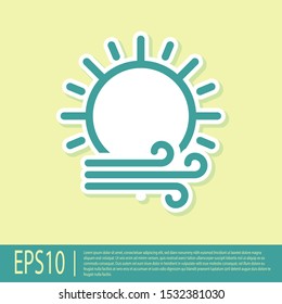 Green Wind and sun icon isolated on yellow background. Windy weather.  Vector Illustration