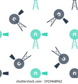 Icono del molino de viento verde aislado patrón sin fisuras sobre fondo blanco.  Vector