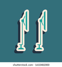 Green Windscreen wiper icon isolated on blue background. Long shadow style. Vector Illustration