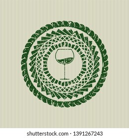 Green wine cup icon inside distress with rubber seal texture