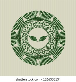 Green wings icon inside grunge style stamp