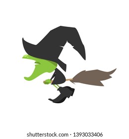 the green witch on the broom. flying with a broom. 