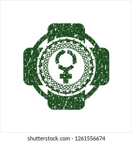 Green women cycle icon inside rubber seal with grunge texture