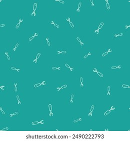 Icono de llave inglesa verde aislado patrón sin costuras sobre fondo verde.  Vector