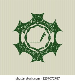 Green writer icon inside distressed rubber stamp