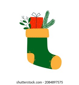 Green and yellow christmas sock with gift box, branches of mistletoe and fir. Christmas winter design element in doodle style. Isolated vector illustration 