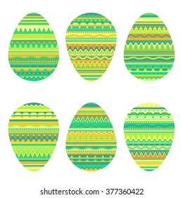 Green and yellow ornate Easter eggs, vector illustration. Elements, isolated.