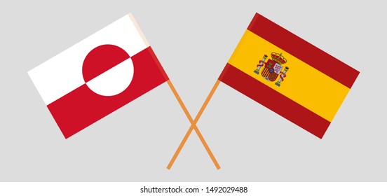 Greenland and Spain. Crossed Greenlandic and Spanish flags