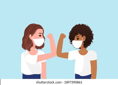 Greet elbow bump icon.Smiling diverse female colleagues wearing protective face masks greeting bumping elbows at workplace, woman coworkers in facial covers protect from COVID-19 coronavirus in office