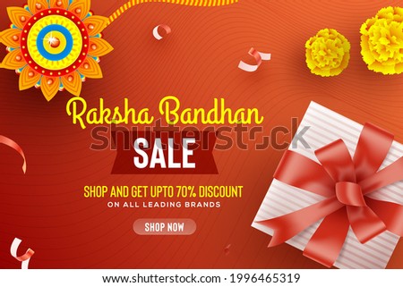 Greeting background with decorated rakhi and gift for Raksha Bandhan (Bond of protection and care) – Indian festival of sisters and brothers.