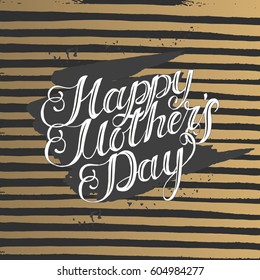 Greeting background with golden black stripes and hand written trendy lettering. Mother's day. Typographical vector design