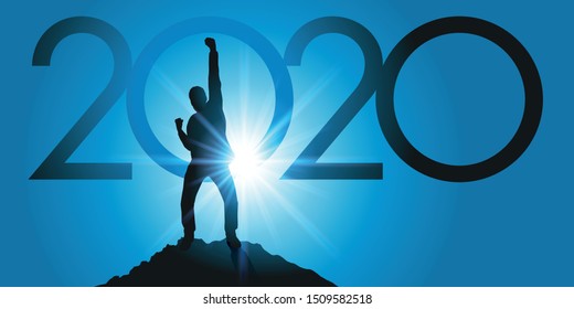 Greeting card 2020 showing a satisfied man raising his fist as a sign of victory after reaching his goal on reaching the top of a mountain.