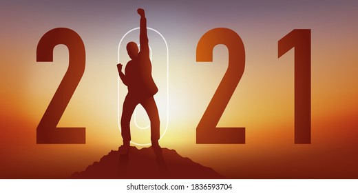 Greeting card 2021 showing a man raising his fist in victory after reaching his goal by reaching the top of a mountain.