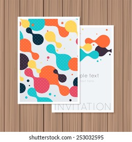 Greeting card with abstract background on a wooden background