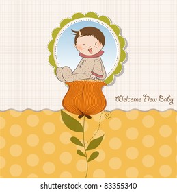  greeting card with a baby sitting on a flower