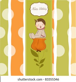  greeting card with a baby sitting on a flower