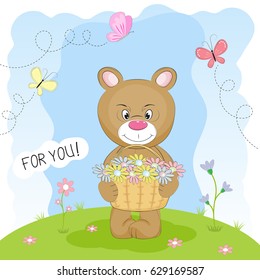 Greeting card bear in the meadow carrying a basket of flowers.