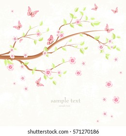 greeting card with branch of sakura and flying butterflies around on grunge background