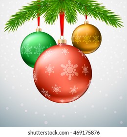 Greeting card with Christmas balls, fir tree branches and snowflakes on a light winter background. Bright colored balls with a pattern of snowflakes hanging on red ribbon.