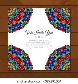 Greeting card with colorful mandala pattern. East Indian style. Beautiful background for greeting card, party or event invitation, flyer, birthday, mother's day, wedding. Vector illustration.