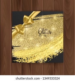 Greeting card cover with golden glittering texture and golden bow. Postcard on a wooden substrate, vector EPS 10 illustration
