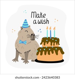 Greeting card with cute capybara and birthday cake. Hand drawn flat vector illustration and make a wish lettering. Funny animal.	