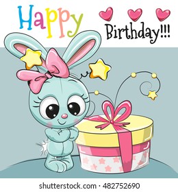 Tarjeta de felicitación lindo conejo con regalo sobre un fondo azul