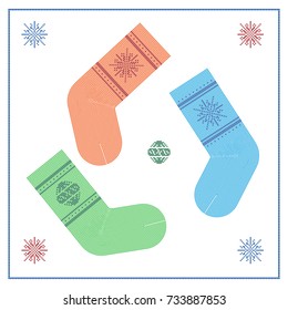 Greeting card with decorative green, red, blue knitted Christmas sock, snowflake and Christmas tree toy