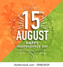 Greeting card design with stylish text 15th August on Ashoka Wheel and grungy national flag colors background for Indian Independence Day celebration. 