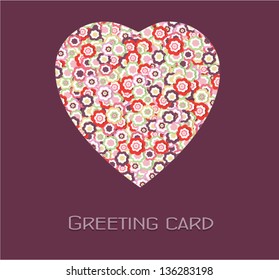 Greeting card with a floral pattern and heart