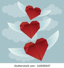 Greeting card with flying red origami hearts and paper clouds