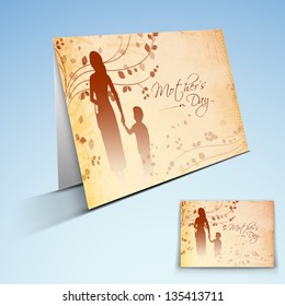 Greeting card or gift card with text Happy Mother's Day and silhouette of a mother holding hand of her child.