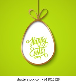 Greeting card with golden easter egg and handwritten holiday wishes of a Happy Easter. Vector illustration.