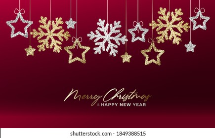 Greeting card with golden and silver shiny snowflakes and stars hanging on strings, merry christmas and hppy new year copy, dark red velveteen background