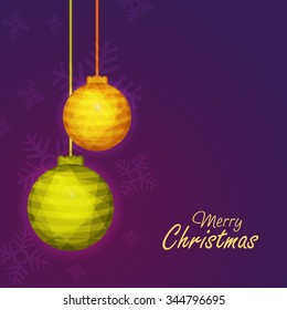 Greeting card with hanging Xmas Balls on glossy Snowflakes decorated purple background for Merry Christmas celebration.