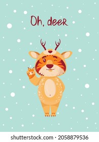 greeting card with the inscription Oh deer with a cute chinese tiger, the symbol of the  new year. flat style. tiger in kigurumi deer costume shows peace and winks with tongue sticking out