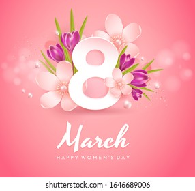 Greeting card for International Women's Day (March 8). Number 8 in apple blossom with a pink ribbon, purple crocuses and pearls on a pink background.