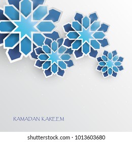 Greeting card with intricate Arabic paper graphic of Islamic geometric art. Ramadan Kareem is the name of the glorious month of Ramadan. Muslim community festival