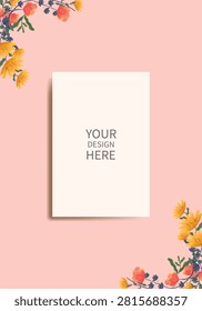 Greeting card, invitation mockup with blank white card surrounded by flowers on a soft pastel background. Elegant floral frame with copy space for branding, wedding invitation, stationery, or creative design presentation.