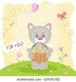 Greeting card kitty in the meadow carrying a basket of flowers.