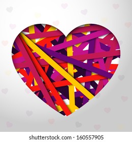 Greeting card made from bundle of bright laces with red heart cut through the paper. For Happy Valentines day, Wedding, or Love messages.