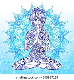 Greeting Card: Merry Christmas and a Happy New Year. The girl in a pose of yoga, meditation on the background of big snowflakes, mandala or kaleidoscope. Cool colors, winter