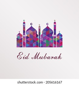 Greeting card with mosque silhouette formed from colorful geometric shapes isolated on white background for holy month of muslim Eid Mubarak.