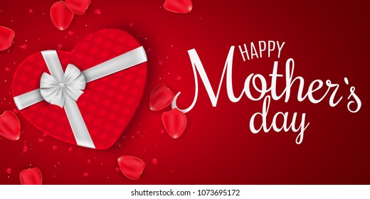 Greeting card for Mothers Day. Red gift box of heart with bow. Red background. Rose petals and confetti. I love mommy. Calligraphy and lettering. Vector illustration. EPS 10