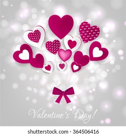 Greeting card with a picture of the ornament of hearts and snowflakes for decoration Valentine's Day