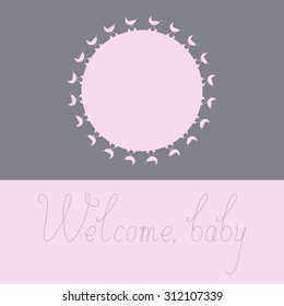 Greeting card with pink colored round space for photo decorated with pink colored prams on grey background, grey colored calligraphic lettering Welcome baby on pink background. Baby shower invitation